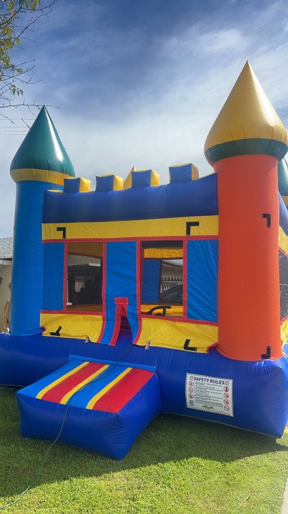 Multi colored castle #2 - Cannons Bounce Houses